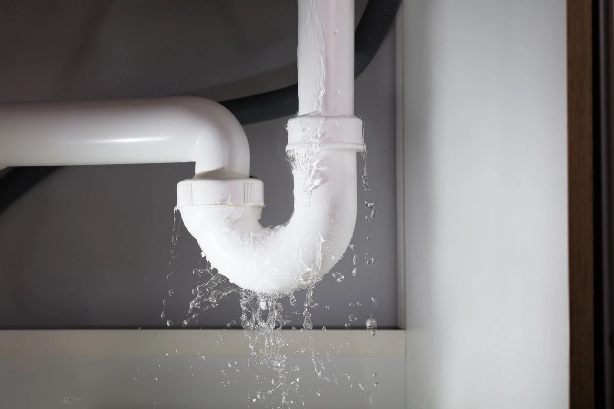 PVC pipe leak water splash